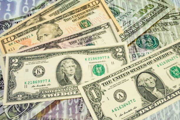 istock close up US dollar banknotes on background. 1213637609