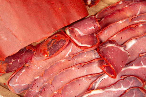istock Turkish bacon, pastrami ( kayseri pastirma ) Fresh sliced pastrami 1213637630