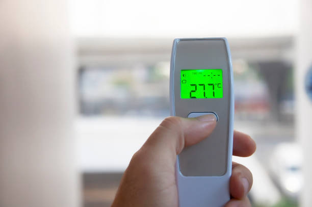 istock Digital Infrared Thermometer for body temperature scan from Coronavirus Disease 2019 (COVID-19). 1213642521