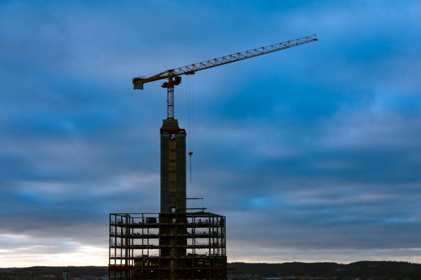 Construction projects using cranes A crane being used to work on a construction project in Gothenburg, Sweden. gothenburg by night sweden scandinavia stock pictures, royalty-free photos & images