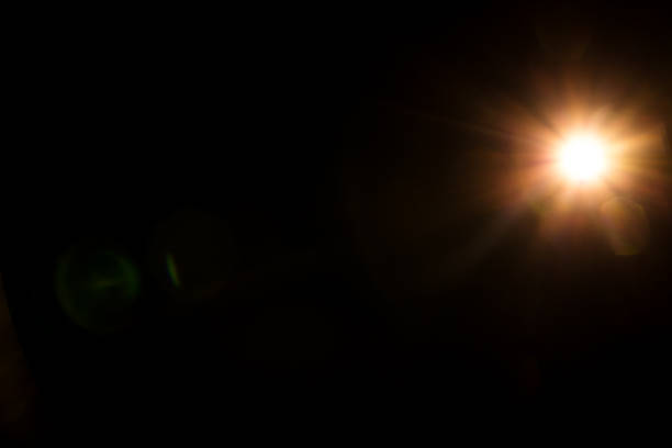 istock abstract lens flare red light over black 1213647767