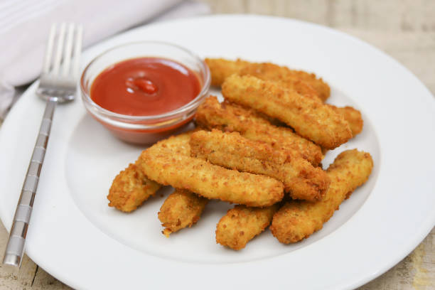 istock chicken nuggets and ketchup 1213648578