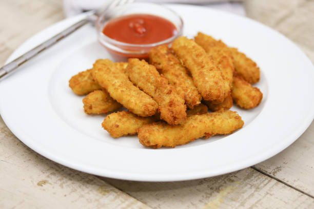 istock chicken nuggets and ketchup 1213648609