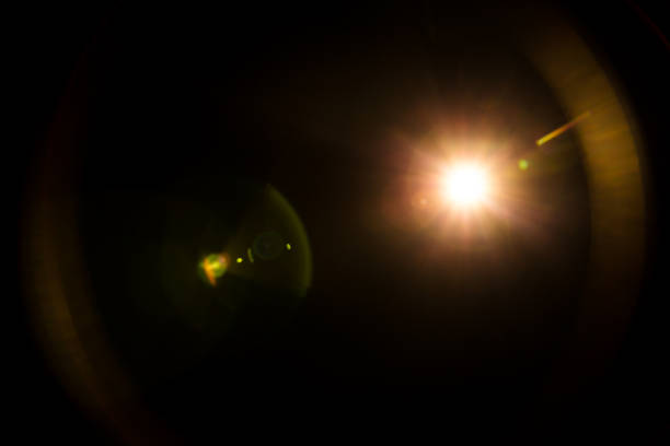 istock abstract lens flare red light over black 1213649737