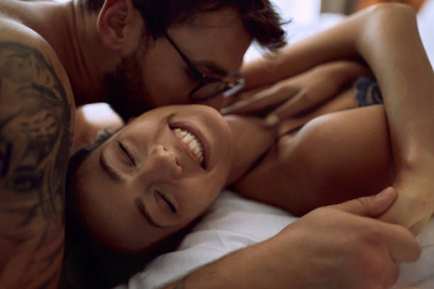 istock Tenderness in every touch. lovers in bedroom. 1213652706