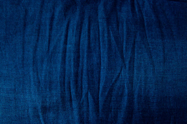istock Textured striped blue jeans. Canvas denim texture. Blue denim that can be used as background. Blue jeans texture for any background. 1213654280