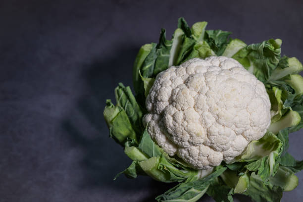 istock Bio cauliflower on concrete background. Copy space. Close up view. 1213655538