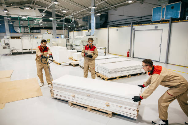 istock Senior manager supervising carpenters during their work in a workshop 1213655654