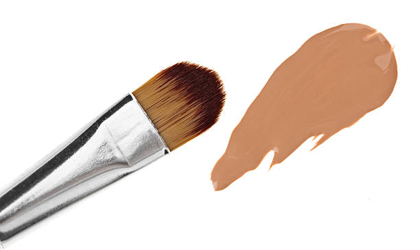 istock Beige liquid foundation makeup stroke with brush 121365805