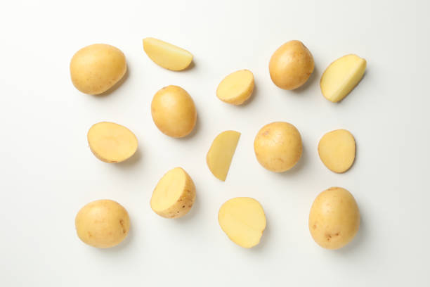 istock Flat lay with young potato on white background, top view 1213661804