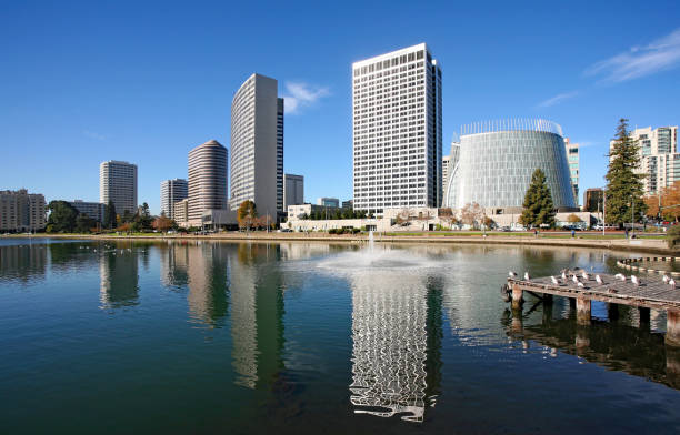Lake Merritt A view of downtown Oakland from Lake Merritt in Oakland, California, United States. oakland california stock pictures, royalty-free photos & images