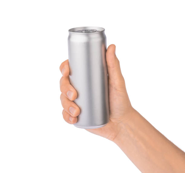 istock Hand holds metal beverage drink can isolated on white 1213670401
