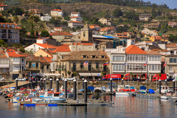 smal fishing boats in the marina of Bayona in Galicia Bayona, Spain - July 26, 2019: smal fishing boats in the marina of Bayona in Galicia bayonne stock pictures, royalty-free photos & images