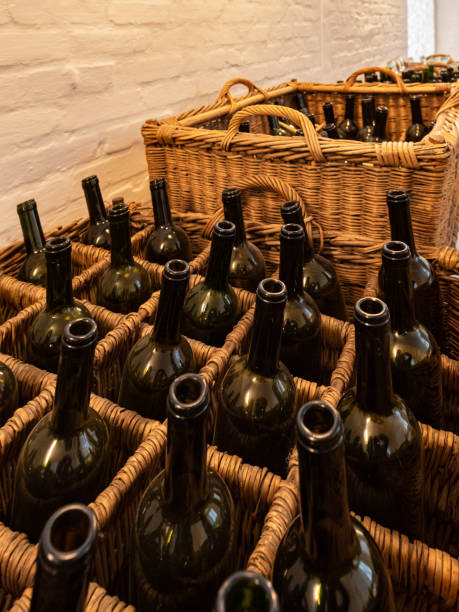 istock Empty dark glass bottles ready for bottling wine 1213673669