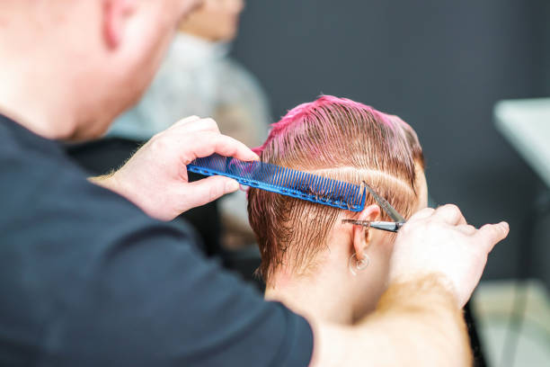 istock Woman having her haircut. 1213675809