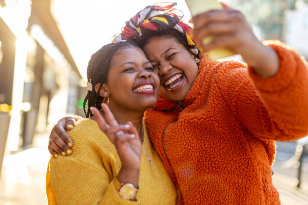 istock Beautiful happy girlfriends taking a selfie together 1213677267