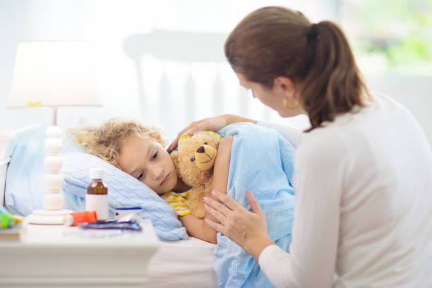 istock Sick little boy with asthma medicine. Ill child. 1213678762