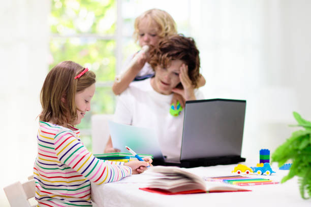 istock Mother working from home with kids. Quarantine. 1213683138
