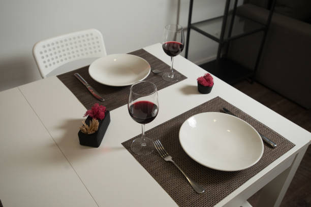 istock Glassware and cutlery for catered event dinner. 1213685102