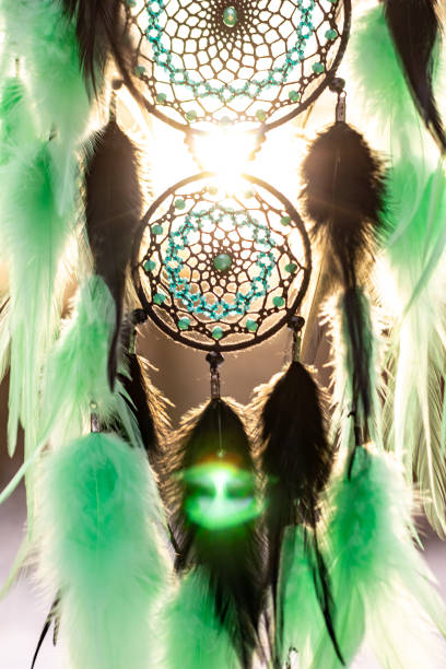 istock Handmade dream catcher with feathers threads and beads rope hanging 1213688365