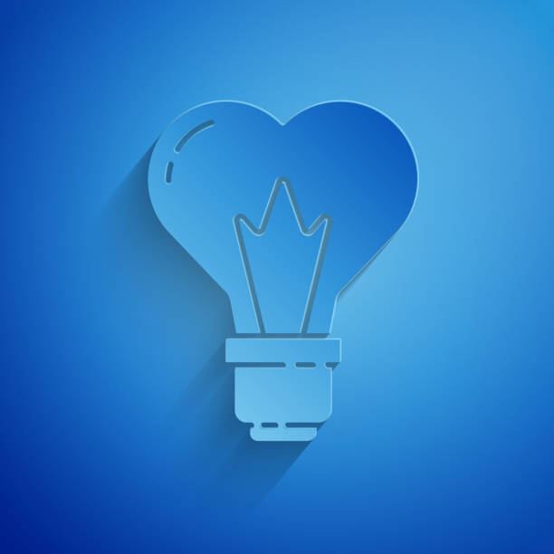 istock Paper cut Heart shape in a light bulb icon isolated on blue background. Love symbol. 8 March. International Happy Women Day. Paper art style. Vector Illustration 1213689124