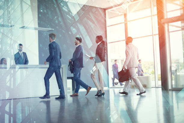 istock Business people arriving at reception 1213692028