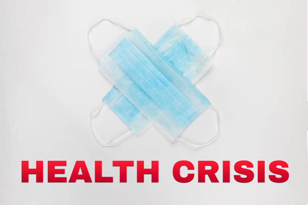 istock two blue surgical medical masks on white background 1213694746