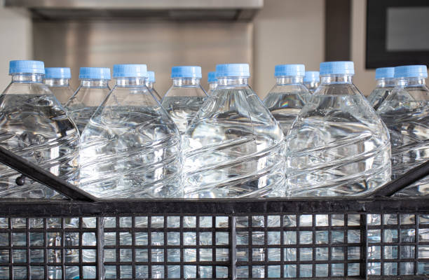 istock plastic bottles of water close-up 1213695140