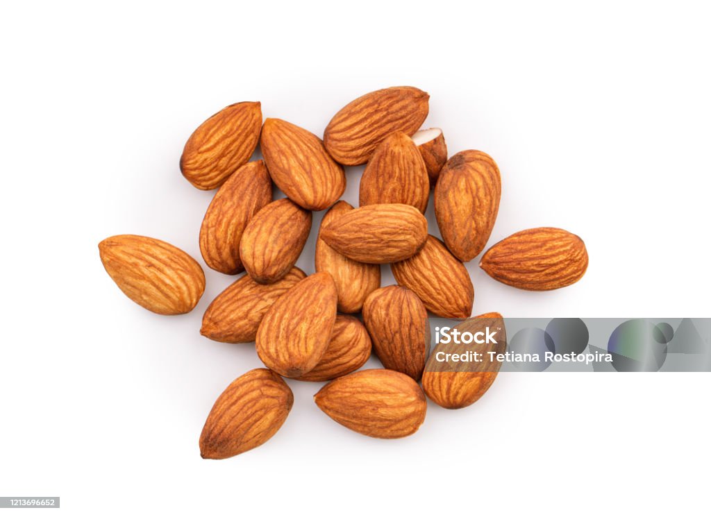 Heap of almonds isolated on white background, top view Almond Stock Photo