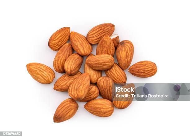 Heap Of Almonds Isolated On White Background Top View Stock Photo - Download Image Now