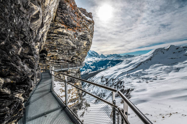 The Elevated Walkway Called Cliff Walk On The Cliffs Of Grindelwald First The Elevated Walkway Called Cliff Walk On The Cliffs Of Grindelwald First Grindlewald stock pictures, royalty-free photos & images