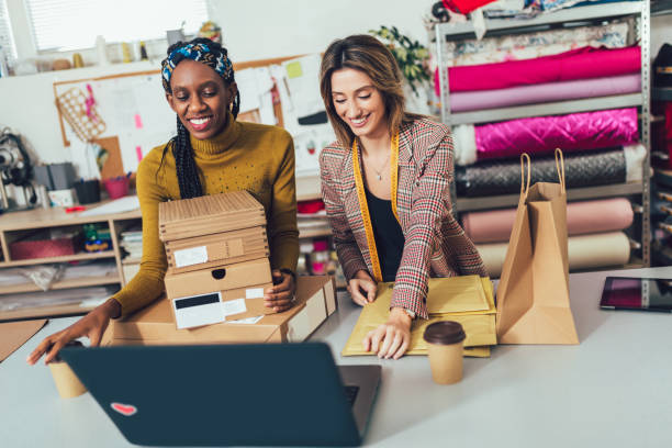 istock Sales Online. Working women at their store. 1213698058