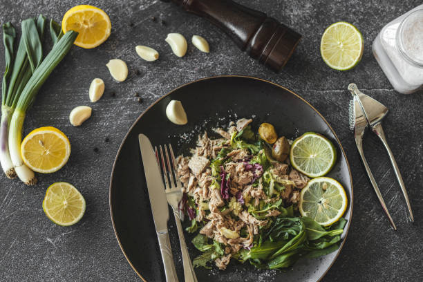 istock Salad with tuna fish, vegetable and lemon 1213699959