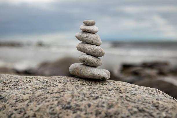 istock Pile of rocks by the ocean 1213701460
