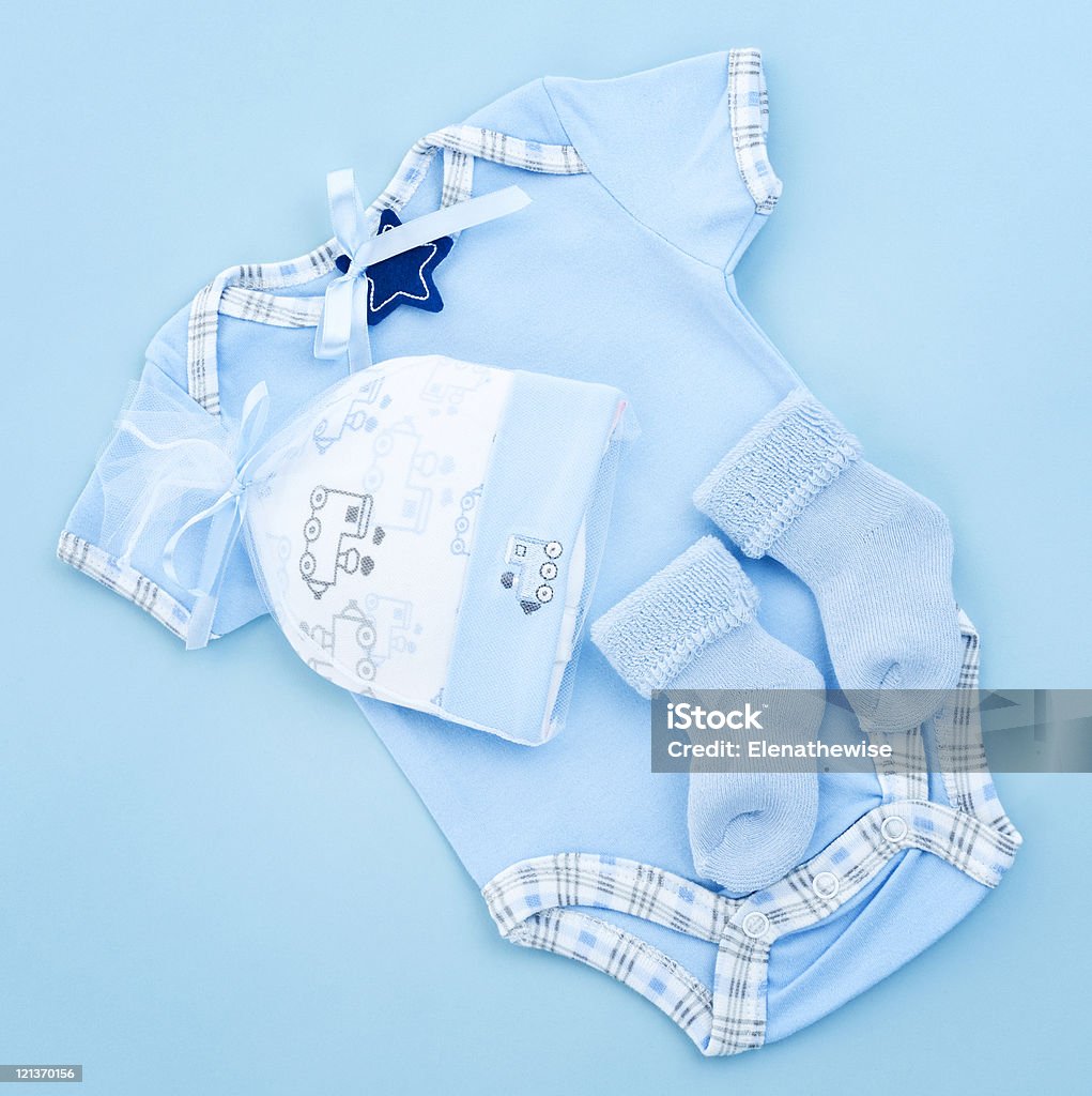 Blue baby clothes for infant boy  Baby Clothing Stock Photo