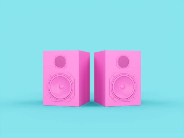 istock 3D rendering Pink speakers isolated on blue background 1213704074