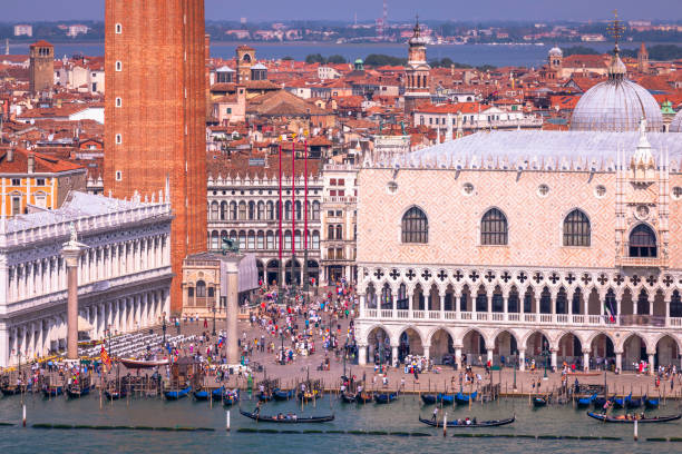 Above San Marco square from San Giorgio Maggiore - Venice, Italy San Marco square from San Giorgio Maggiore - Venice, Italy venice italy grand canal honeymoon gondola stock pictures, royalty-free photos & images