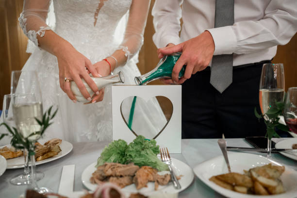 istock bride and groom at a sand ceremony 1213708025
