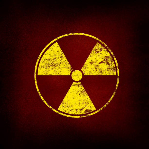 istock Yellow radioactive sign over black background 1213708052