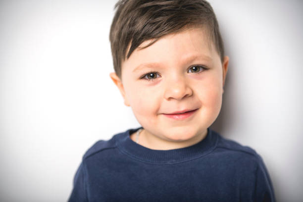 istock close portrait of a four years old boy over white 1213708155