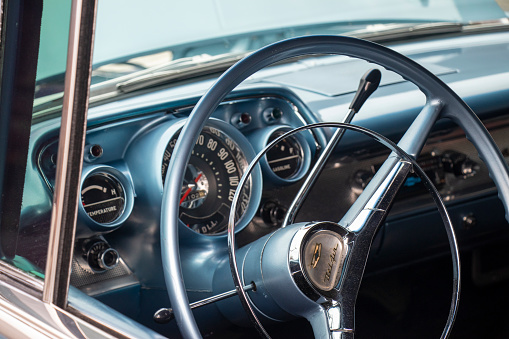 Monroe, Georgia - March 14, 2020: Close-up of the steering wheel and dashboard of a classic Chevrolet Bel Air on display at the 15th Annual Memories in Monroe Car Show.