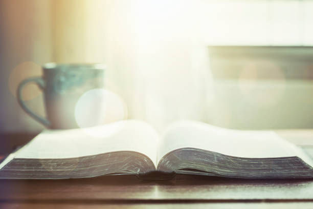 istock The holy bible and a cup of coffee on table 1213713704