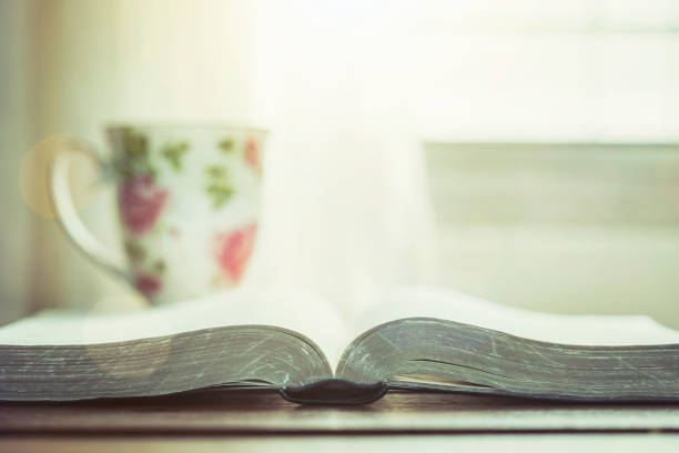 istock The holy bible and a cup of coffee on table 1213713720