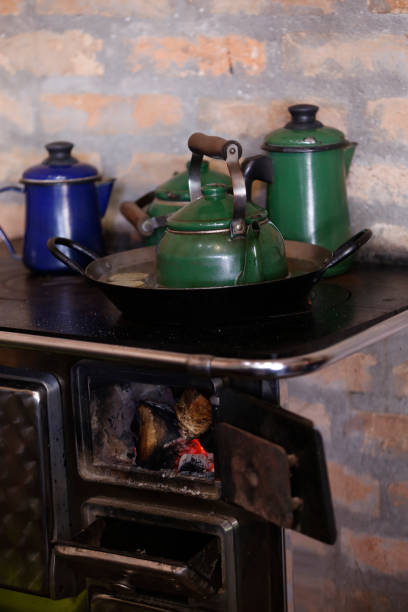 istock coffee kettle in wood burning stove 1213714250