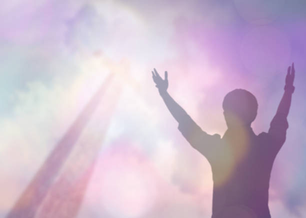 silhouettes of man raise hand up worship god over the cross in cloudy sky - revival imagens e fotografias de stock