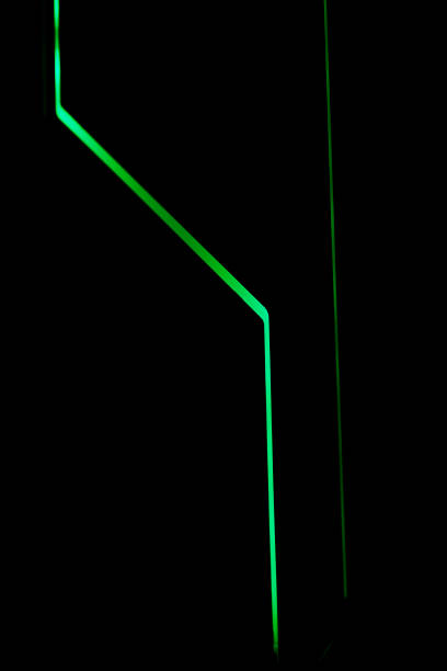 istock Green lines of computer front LED light on black background. 1213716628
