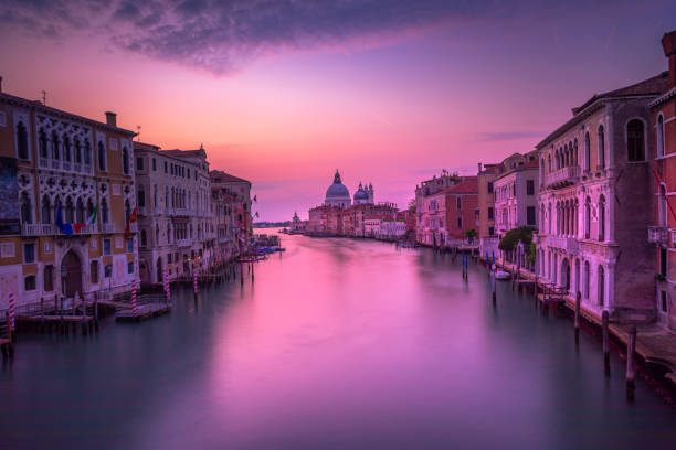 Ethereal long exposure - View of Grand Canal at sunrise, Venice, Italy Ethereal long exposure - View of Grand Canal at sunrise, Venice, Italy venice italy grand canal honeymoon gondola stock pictures, royalty-free photos & images