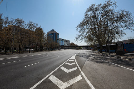 The main street of the financial district in Madrid, Paseo de la Castellana, is empty during the lockdown declare by the government in Spain