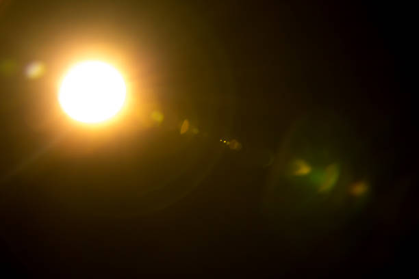 istock Abstract Natural Sun flare on the black 1213718395