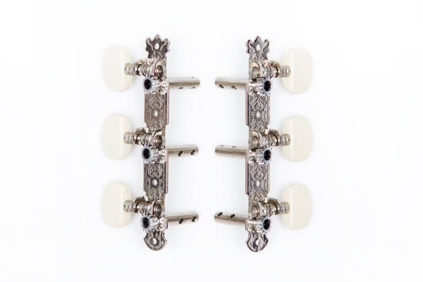 istock Guitar tuning pegs isolated on white 1213719250